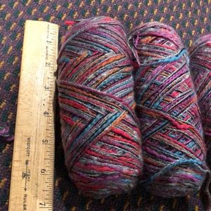 2- skeins 3. ply multi tone variegated yarn